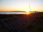 Near midnight, the sun is setting over Reykjavik