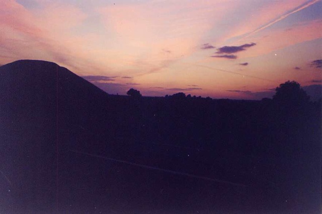 Sunset beyond Silbury, around summer solstice 2000. this photo was taken from the path to West Kennett